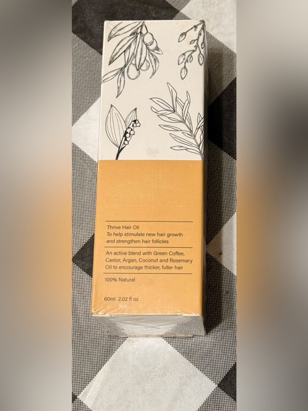 Thrive Hair Oil - White and Orange Packaging
